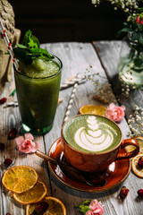 Asian matcha green latte art with green smoothie