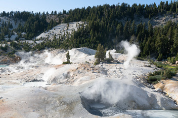 Lassen Volcanic National Park. Rocky trail with grand vistas descends to a boardwalk through Lassen's largest hydrothermal area. Trailhead at Bumpass Hell Parking area.