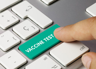 Vaccine test - Inscription on Green Keyboard Key.