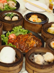 Group of steamed dumpling, Dim Sum, Chinese food brunch with Chinese style roasted duck.