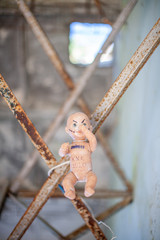 Doll in the design of a hanged basketball basket