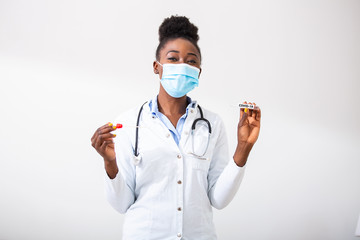 Female african american doctor holding a swab collection stick, nasal and oral specimen swabbing , patient PCR testing procedure appointment, Coronavirus COVID-19 global pandemic crisis