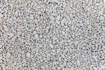 Stone gravel at a construction site as a background.
