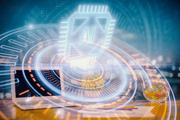 Double exposure of table with computer on background and data theme hologram. Data technology concept.