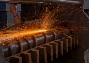 industrial grinding process produces fire sparks
