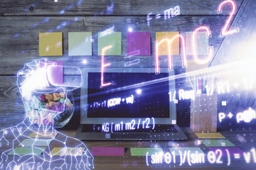 Desktop computer background and formula hologram writing. Double exposure. Education concept.
