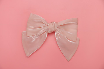 Beautiful hair bow for girls on pink background.