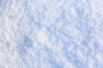 Texture of the white fluffy snow for background