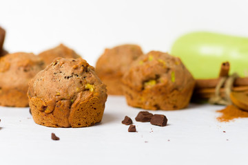chocolate muffins with zucchini and banana. wet veggie cupcakes home-made, top view on a light background. cooking muffins in the kitchen. vegan bread for healthy eating