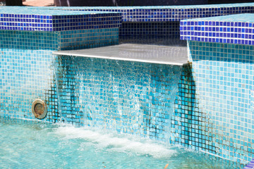 Blue fountain in the form of a waterfall