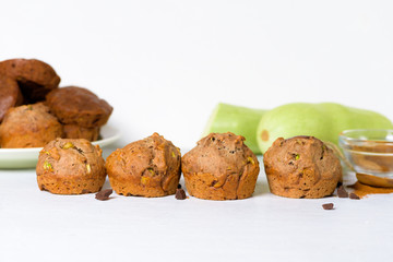chocolate muffins with zucchini and banana. wet veggie cupcakes home-made, top view on a light background. cooking muffins in the kitchen. vegan bread for healthy eating