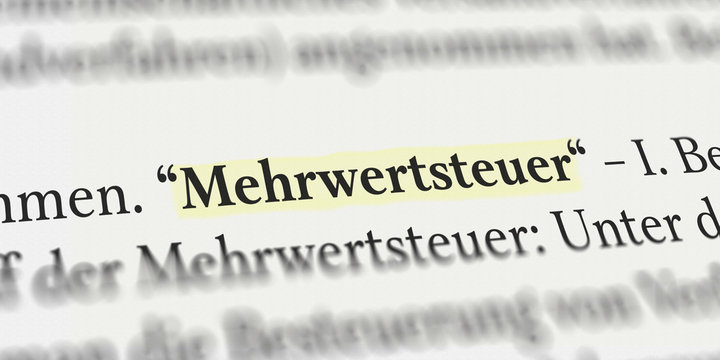 Mehrwertsteuer im Buch mit Textmarker markiert