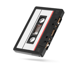 Old autio tape compact cassette with blank tag isolated on white