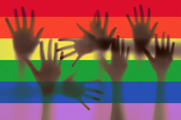 LGBT support,  hands and rainbow colors  spectrum flag