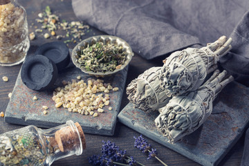 White sage smudge sticks, herbs and olibanum