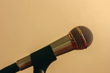 Close up of golden microphone