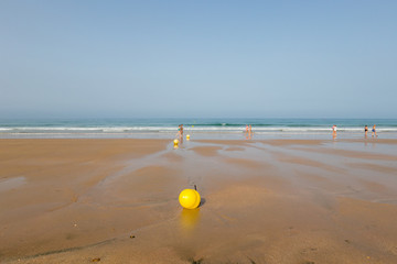 La Barrosa beach in Sancti Petri, Cádiz, with a large amount of sand without water as the tide is low