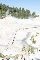 Lassen Volcanic National Park. Rocky trail with grand vistas descends to a boardwalk through Lassen's largest hydrothermal area. Trailhead at Bumpass Hell Parking area.