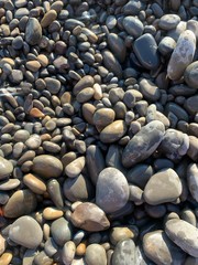 Pebble stones background, beach, natural colors