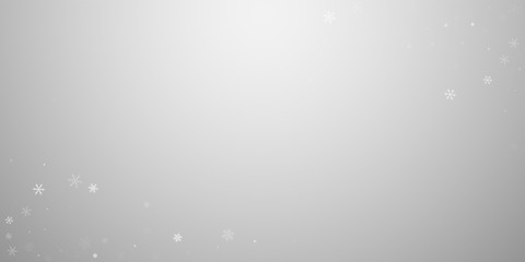Sparse snowfall Christmas background. Subtle flyin