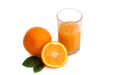 Two apsins and orange juice in a glass on a white background isolate