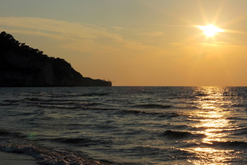 Fototapeta na wymiar Peschici : trabucco al tramonto