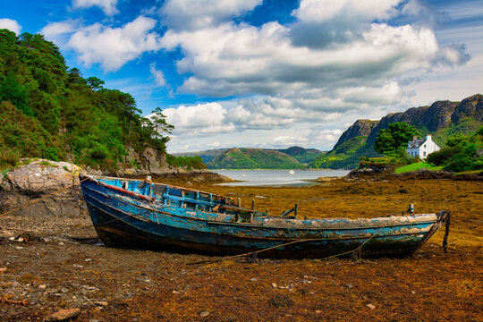 old ship wreck at Plockton, with views to mountains, Highlands, Scotland.