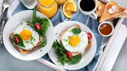 Traditional breakfast on wooden tray