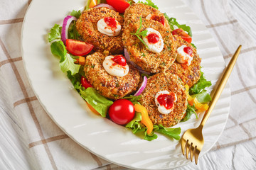 vegan burger of legume, onion and greens
