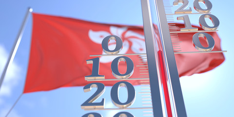 Thermometer shows 0 zero air temperature near waving flag of Hong Kong. Weather forecast conceptual 3D rendering