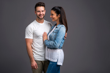 Fototapeta premium Nice young couple in the studio