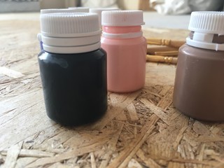 watercolor in jars and brushes