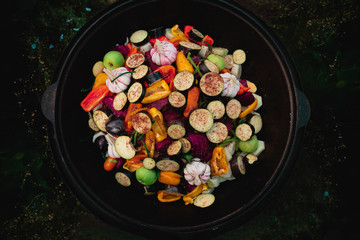 vegetables in a cauldron in nature