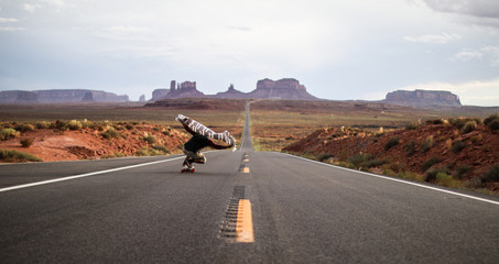 Longboarding on Monument Valley road
