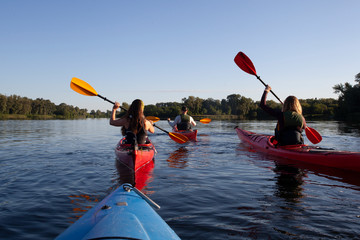 Kayaking. People paddling a kayak. Canoeing. Paddling.
