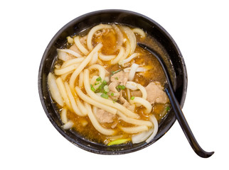 Udon Noodle Soup and Pork with spoon on white background