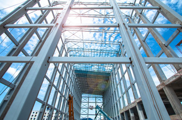 Structure of steel for building construction on sky background.