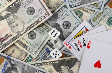 American dollars, banknotes, cash money with playing cards and gambling dice, background and texture