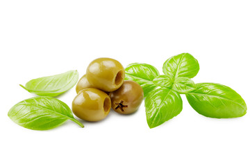 green marinated olives with basil leaves isolated on white background