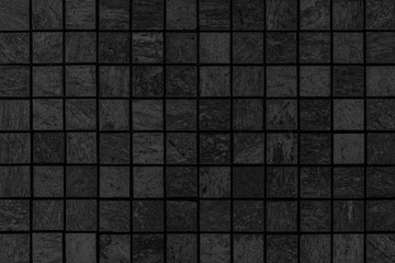 Black mosaic wall tile pattern and seamless background
