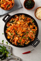 Kimchi cabbage with chicken. Prepared in a wok.