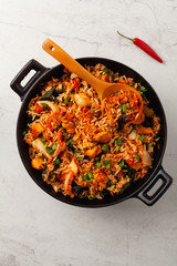 Kimchi cabbage with chicken. Prepared in a wok.