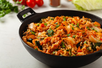 Kimchi cabbage with chicken. Prepared in a wok.