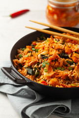 Kimchi cabbage with chicken. Prepared in a wok.