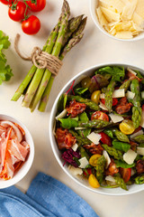 Salad with asparagus and bacon.