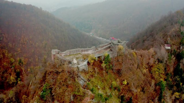 Poenari Citadel in Romania surrounded by autumn nature