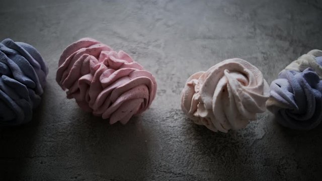 Row of delicious homemade marshmallow on gray textured background