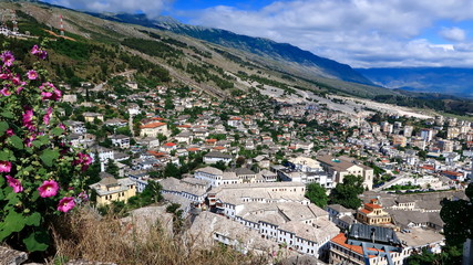 View of Gjirocaster old historical city center set in mountain slope from Gjirocaster castle, Gjirocaster, Albania