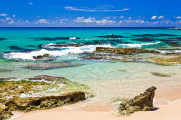 Coastal reef and sea waves with blue sky in the Kending National Park of Pingtung, Taiwan.