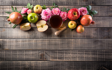 Rosh hashanah (Jewish New Year holiday), Concept of traditional or religion symbols on dark wooden background.